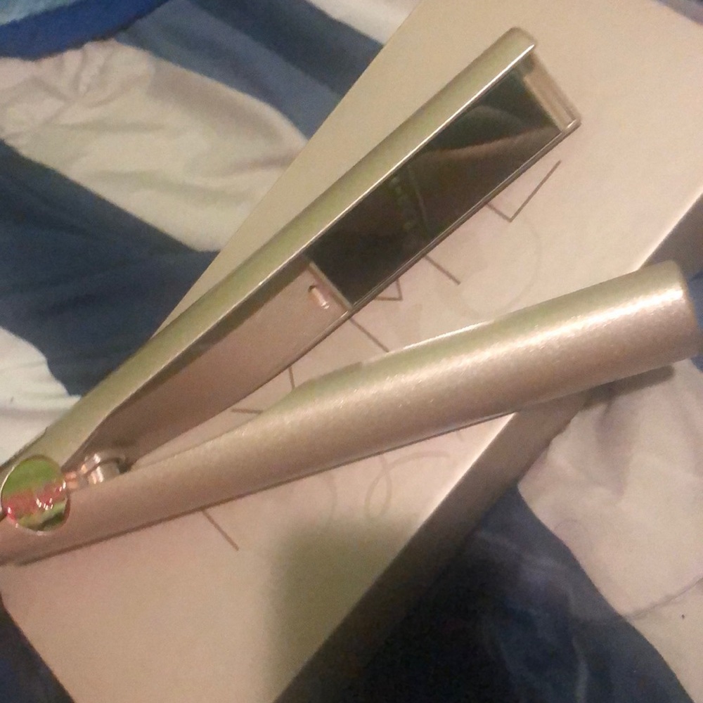 A hair iron, can do multiples things to your hair